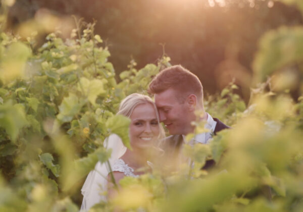 Couple in the vines at La Mare Wine Estate Jersey